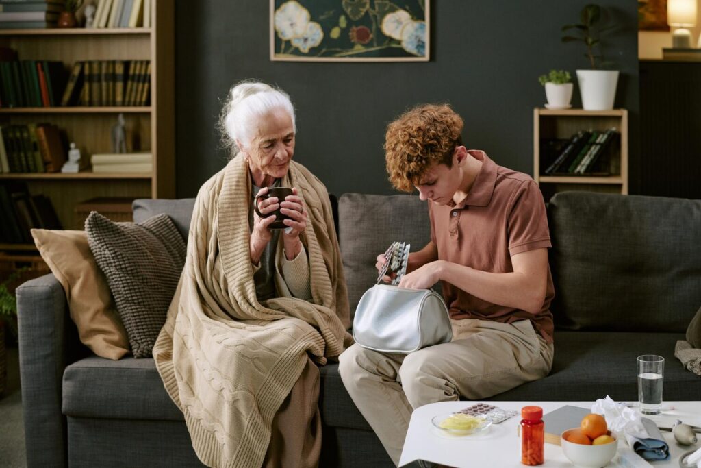 senior caucasian woman watching teenager boy organizing medication home 249974 33159 senior caucasian woman watching teenager boy organizing medication home 249974 33159
