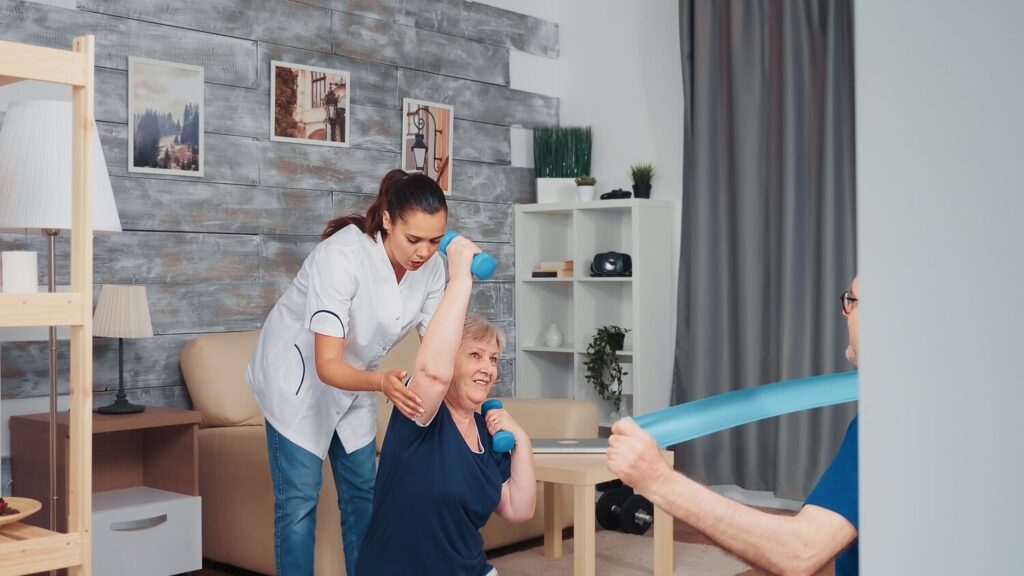 senior couple exercising with therapist yoga mat home home assistance physiotherapy healthy lifestyle old person training healthy lifestyle 482257 3576